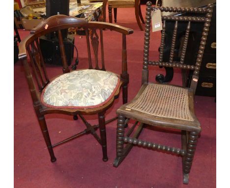 An early 20th century beech bobbin-turned rush seat rocking side chair; together with an Edwardian mahogany tub corner elbow 