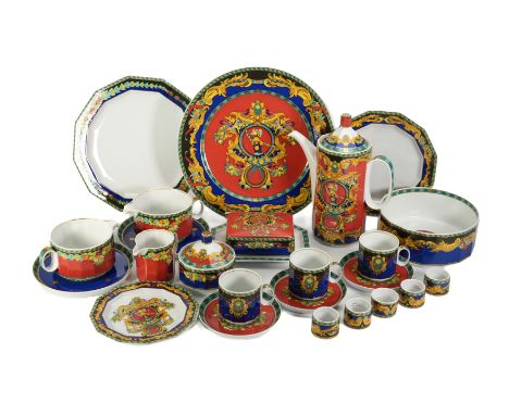 A Versace Le Roi Soleil Rosenthal porcelain 12 place dinner service, comprising twelve dinner plates, twelve chargers, twelve
