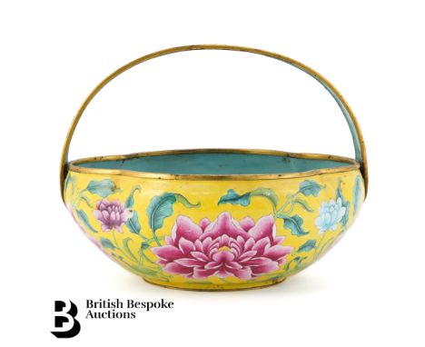 A rare Chinese Imperial yellow enamel flower basket, Qianlong mark and period. The basket features a five-colour palette of y