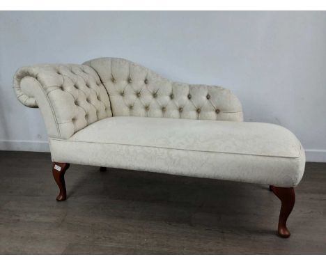 STUART JONES CONTEMPORARY CHAISE LONGUE, with cream button back upholstery74cm high x 140cm wide