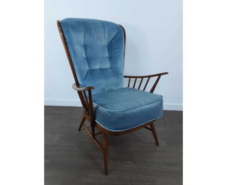 ERCOL EVERGREEN 1913 HIGH BACK CHAIR, recently restored with new strapping, cushion and upholstery in blue velvet, by an Erco