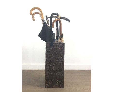 CARVED HARDWOOD STICK STAND, African style with zoomorphic decoration, containing an early 20th century parasol with birds he