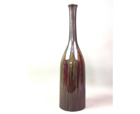CHINESE STUDIO POTTERY VASE, of bottle form with mottled glaze and character signature to base60cm high