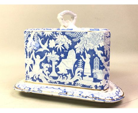 VICTORIAN BLUE AND WHITE LIDDED CHEESE DISH, of wedge form, decorated with figures in a garden setting, along with further it