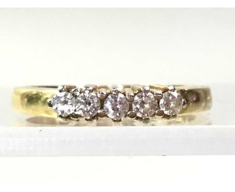 DIAMOND FOUR STONE RING, set with small diamonds, in eighteen carat gold