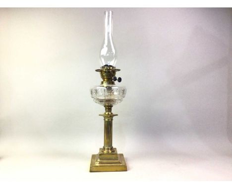 VICTORIAN BRASS DORIC COLUMN OIL LAMP, on a square stepped base, with glass chimney39cm high