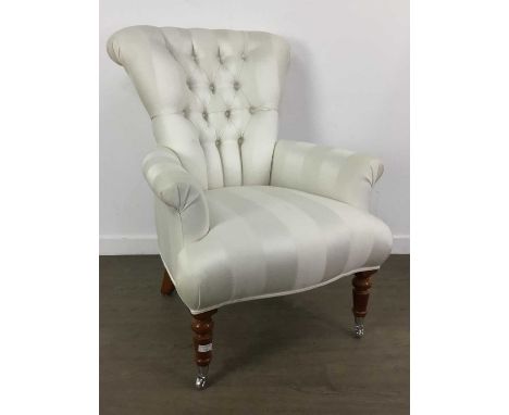 DURESTA WINGBACK ARMCHAIR, 20TH CENTURY  with button back in cream 100cm highHas several areas of damage , mostly to the back