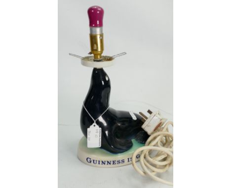 Carltonware Advertising Guinness lamp base: As a seal on a base.