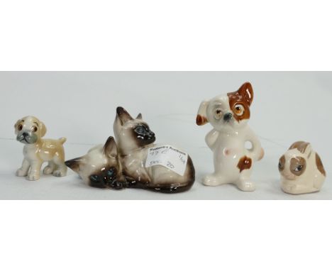A collection ceramic animals to include: Cats Dogs and Rabbits(4)