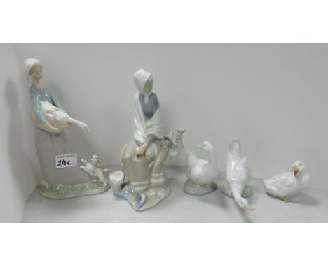 Two Lladro figures Girl with a goose and dog (4866): Issued 197 - 1993, new shepherdess (4576) issued 1969 - 1985 together wi