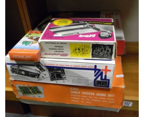 A collection of vintage games to include: Stylophone, Family Table Skittles, Table Top Soccer etc