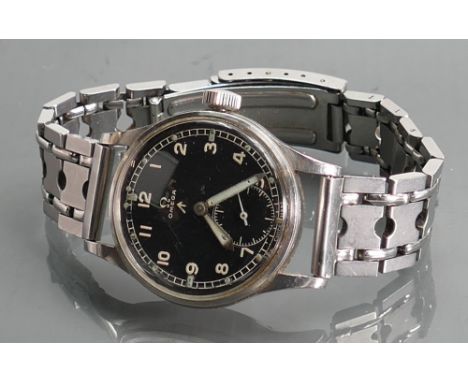 Omega WWII military issue black dial gents wrist watch: Not in working order.  Case 35mm not inc. button.  Case back reads WW