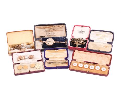 A group of miscellaneous jewellery items including a pair of 9 carat gold cufflinks; the octagonal engine turned plaques with