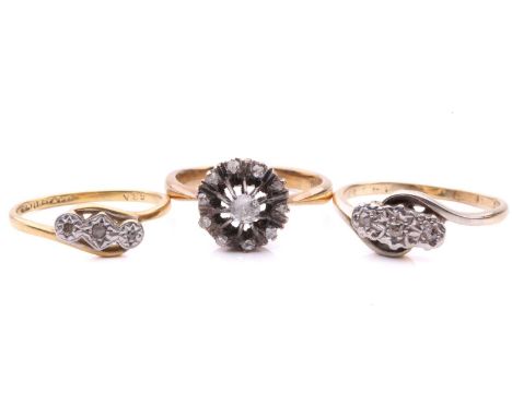 A diamond open work cluster ring, the central old cut diamond with an estimated weight of 0.15ct, surrounded by single cut di