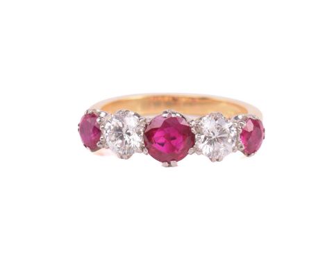 A five-stone synthetic ruby and diamond half-hoop ring in 18ct gold, containing three graduated circular-cut synthetic rubies