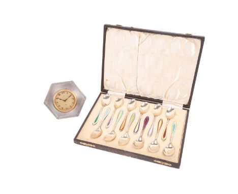 A cased set of twelve "Sterling" gilded and enamel coffee spoons each with contrasting coloured guilloche enamelled handles t