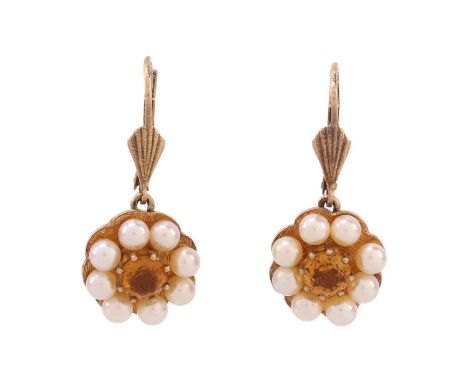 A pair of citrine and cultured pearl cluster earrings, each earring comprises a scalloped mount set with a circular-cut citri