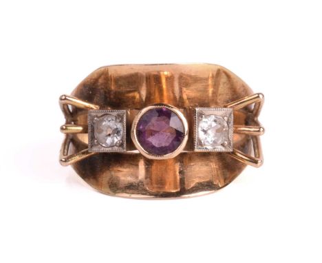 A purple paste and diamond mid-century dress ring, the circular-cut paste in a collet-setting flanked either side by two old 