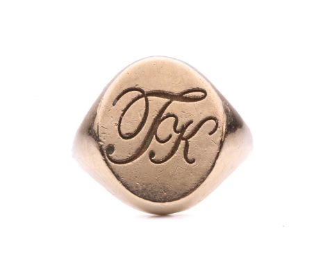 A 9ct yellow gold signet ring, the oval-shaped ring head laser engraved with the initials 'TK', to a D-section shank, Sheffie