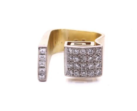 A modernist diamond ring with a greek key design, set with brilliant cut and square step cut diamonds, with a total estimated