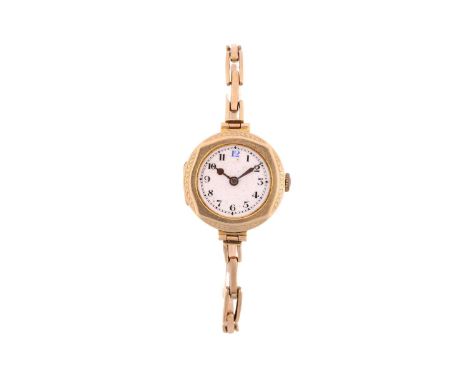 A Ladies Edwardian 9ct gold watch, featuring a hand-wound mechanical movement in a yellow metal case stamped '375' and measur