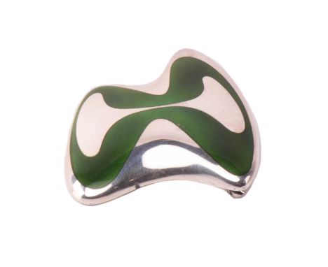 Georg Jensen - an enamel brooch with green enamel on an abstract 'splash' form panel, fitted with a hinged pin stem and roll-