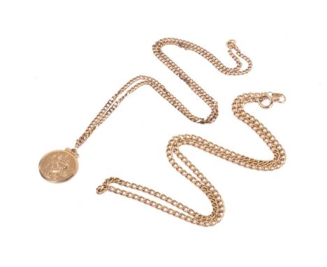 A 9ct gold St. Christopher pendant on chain, and a 9ct gold curb link chain; the circular embossed St. Christopher pendant at