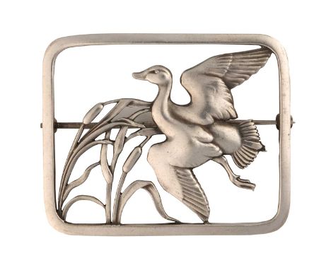 Georg Jensen - a rectangular openwork brooch depicting a duck flying above pond bulrushes, fitted with hinged pin stem and ro