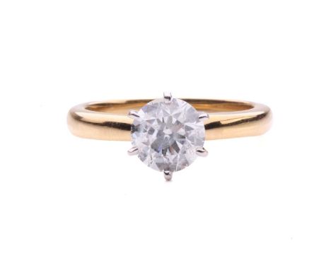 A diamond solitaire ring in 18ct gold, centred with a brilliant-cut diamond of 6.7 mm with an estimated weight of 1.15ct, in 