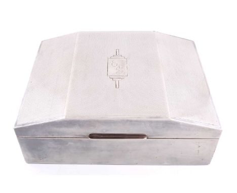 A large white metal cigar box of rectangular form the hinged chamfered cover with engine turned decoration and central Art De