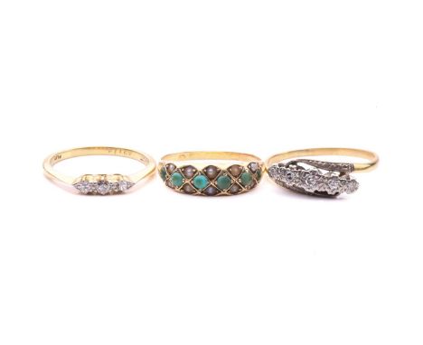 A five stone diamond ring with a total estimated diamond weight of 0.10cts, ring size P, a three stone diamond ring, with a t