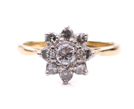 A diamond cluster ring, the flowerhead centred with an old cut diamond further surrounded with eight single-cut diamonds, mou