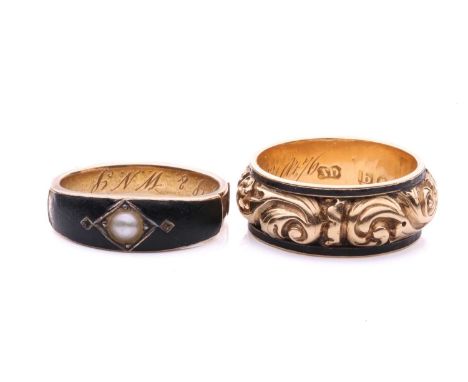 Two 19th-century mourning rings; the first is a Regency mourning ring in 18ct gold, the hollow band chased with acanthus foli