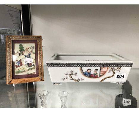 A Chinese shallow bonsai planter and a Middle Eastern miniature painting.