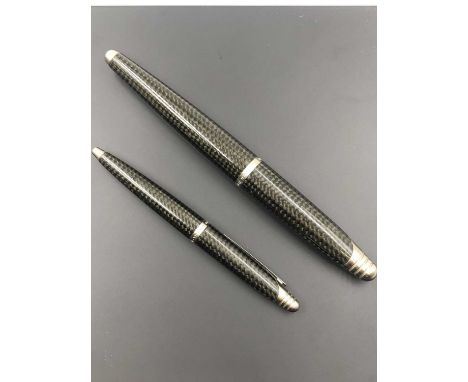 Pens- An Alfred Dunhill AD 2000 carbon fibre fountain pen and a matching biro.