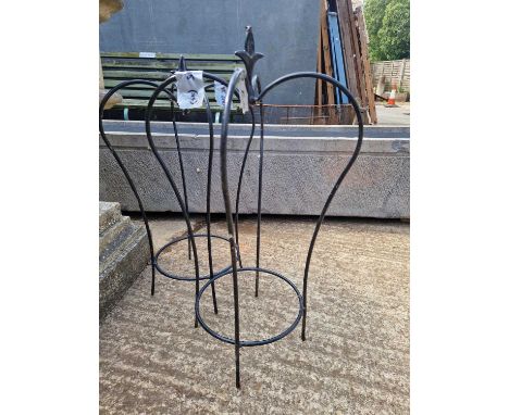 Two crown form garden ornaments