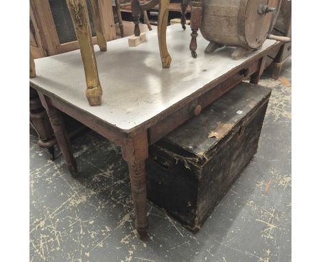 A formica topped pine two drawer table together with a butter churn