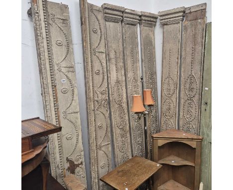 A group of 19th century moulded panelling uprights and cornice