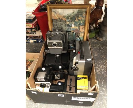 Polaroid cameras, a cine projector together with a small parcel of Meccano