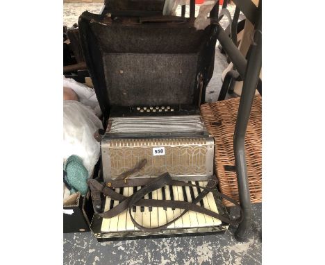 A cased Tasso piano accordion