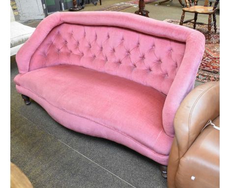 A Victorian Serpentine Two Seater Sofa, with later button back upholstery and on turned supports, 152cm wide