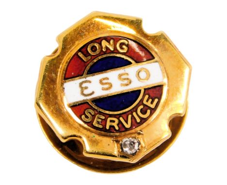 An Esso Long Service pin, enamel decorated set with a tiny diamond, yellow metal, stamped 9ct, engraved WK Day 1956 July, 3.1