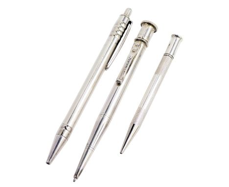 A silver cased propelling pencil, with engine turned decoration, together with a Yard O' Lead metal cased ball point pen and 
