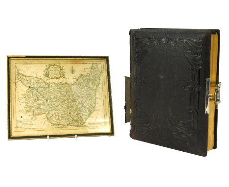 After Thomas Kitchin. A 19thC coloured map of the County of Suffolk, 19.5cm x 24.5cm, together with a leather bound album, co