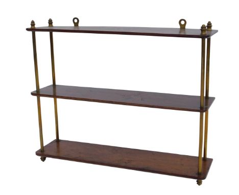 A late 19th/early 20thC mahogany hanging wall shelf, with cylindrical brass end supports, 60cm high, 70cm wide, 17cm deep. 