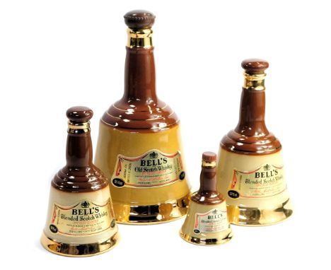 Four Bell's Scotch whisky decanters, of graduated form, the largest 75.7cl. (4)