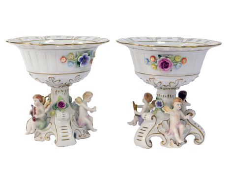 A pair of 20thC Schierholz porcelain centrepieces, each bowl with a pierced border decorated with handpainted and relief deco
