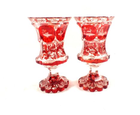 A pair of 19th Century Bohemian red flashed stag, figure and floral vases (one light top rim chip and light base chips), heig