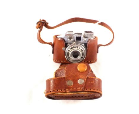 A Mighty Midget camera in case