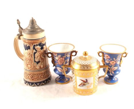 A 19th Century porcelain gilt and bird decorated chocolate cup and cover, a pair of Spode blue ground floral vases (as found)